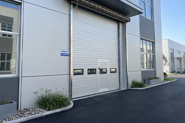 Door-in-door sectional door