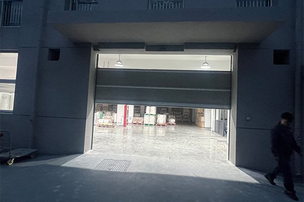 High speed door installation for printing workshop passage