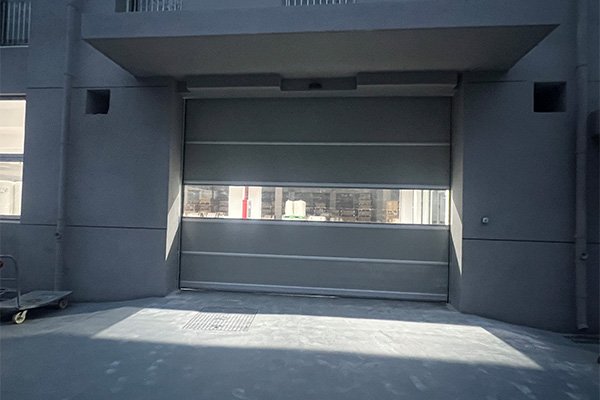 High speed door installation for printing workshop passage
