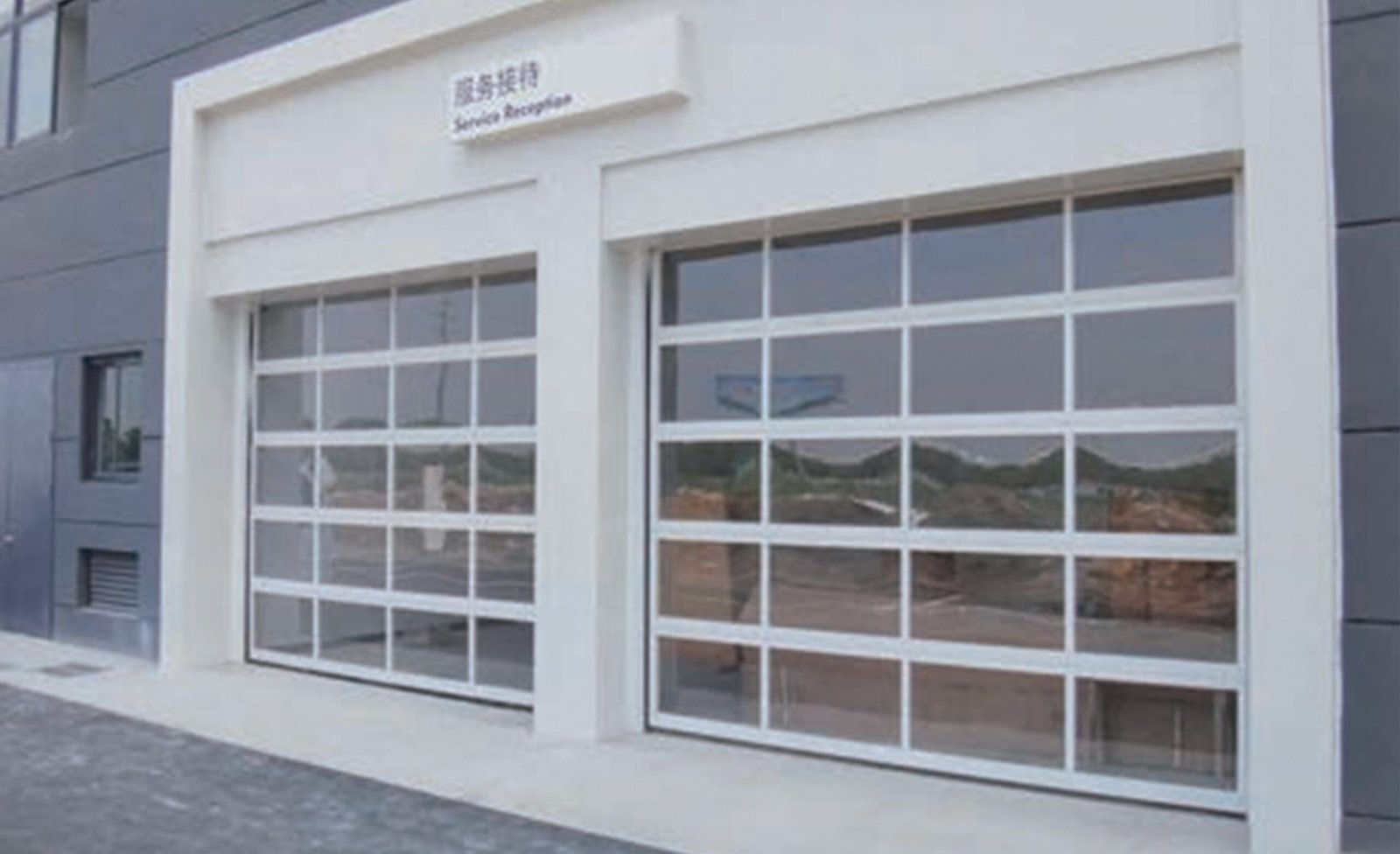 Glazed sectional door for commercial building
