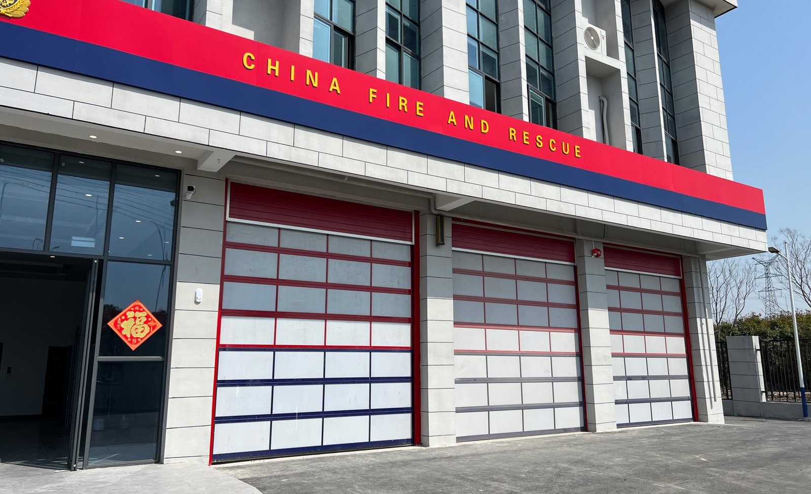 Sectional door with windows for fire station