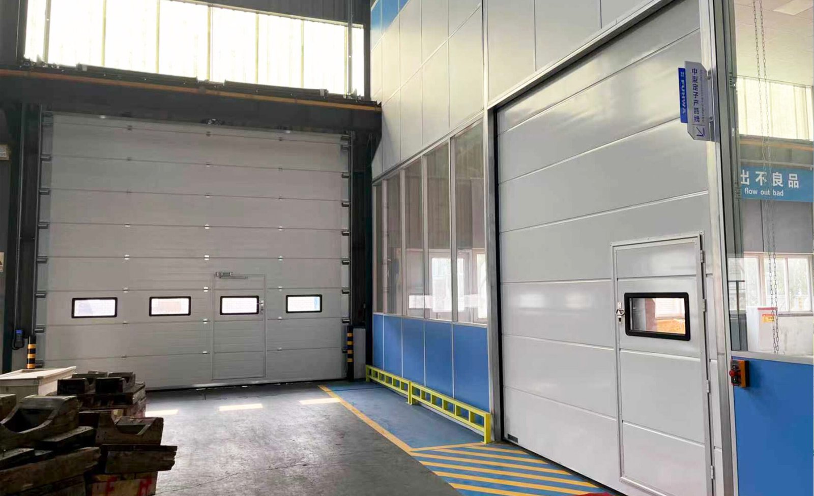 Industrial sectional door for factory workshop