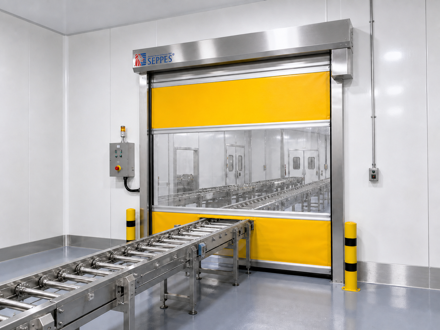 Yellow SEPPES washdown ready high speed door integrated with a stainless conveyor
