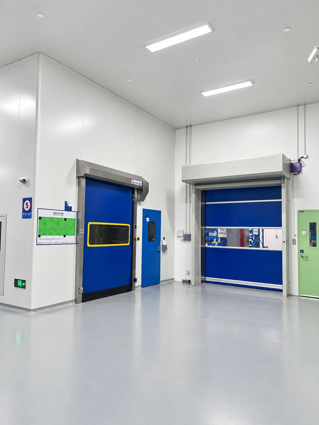 Retouched pharmaceutical cleanroom photograph showing two high speed doors and adjacent personnel entrances